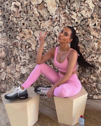 Kim Kardashian Poses in Pink with Nikes