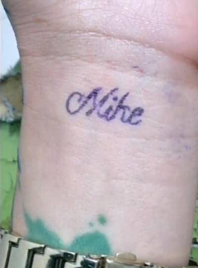 Ximena Cuellar with "Mike" tattoo