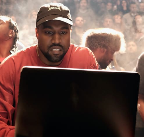 Kanye West at a Computer