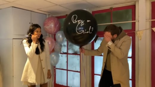 Juliana Custodio and Ben Obscura with a Gender Balloon