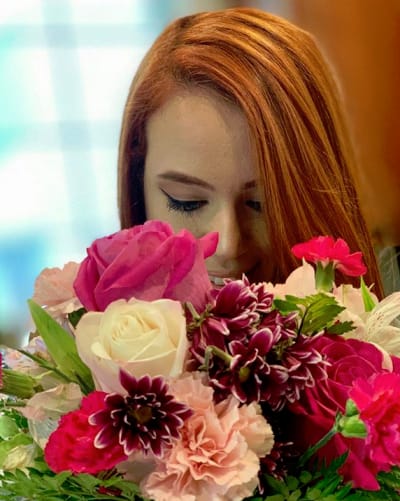 Jess Caroline loves flowers