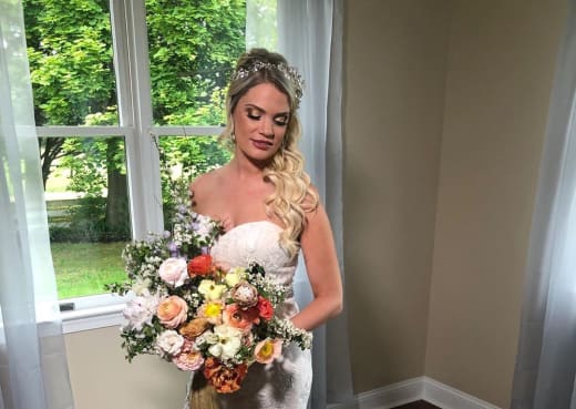 Ashley Martson Holds Mock "Wedding" Bouquet