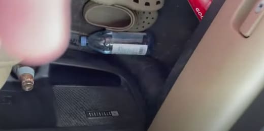 Beer bottle in Jenelle's car