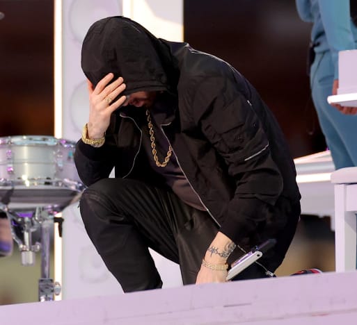 Eminem Kneels