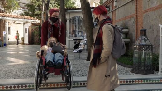 Caleb Greenwood helps Alina Kasha visit a mosque, learns how to wheelchair