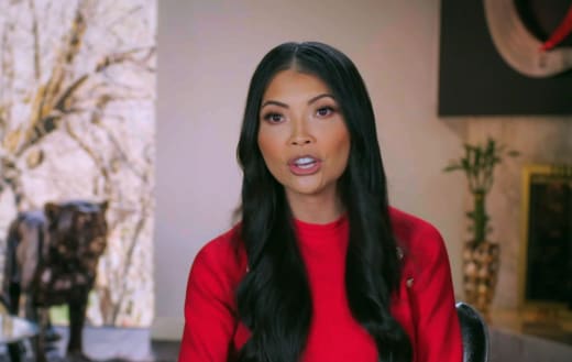 Jennie Nguyen Wears Red in the Confessional