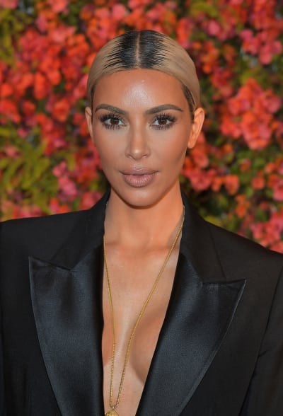 Kim Kardashian naked shoot: Reality star poses covered in 