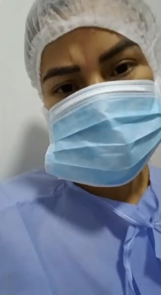 Ximena Cuellar TikTok in surgical mask and scrubs