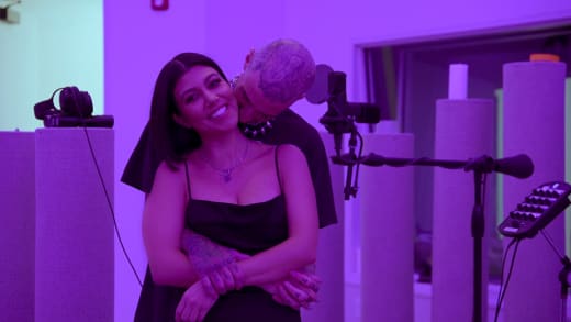 Kourtney Kardashian and Travis Barker Canoodle in Purple